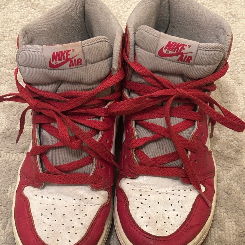 Red and White Nike High Tops